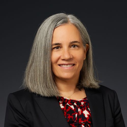 Headshot-KathrynQuadracciFlores-darkbackground